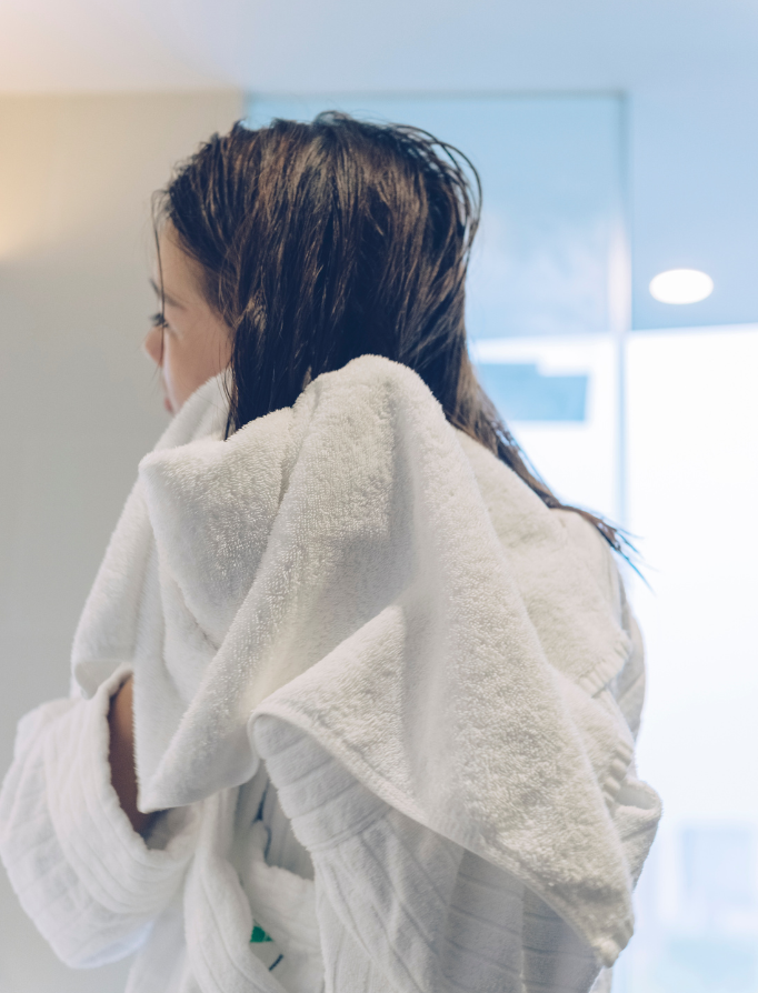 Blot hair after using curry leaves shampoo